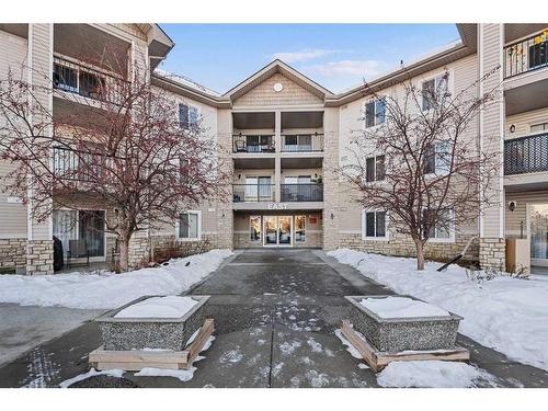 1350-2395 Eversyde Avenue Sw, Calgary, AB - Outdoor With Balcony With Facade