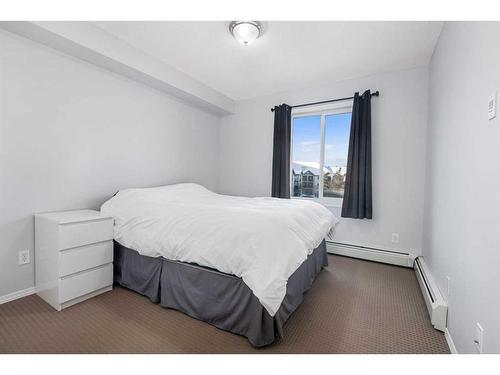 1350-2395 Eversyde Avenue Sw, Calgary, AB - Indoor Photo Showing Bedroom