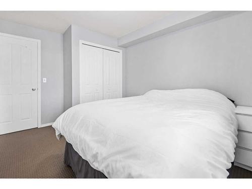 1350-2395 Eversyde Avenue Sw, Calgary, AB - Indoor Photo Showing Bedroom