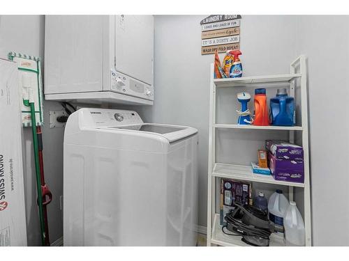 1350-2395 Eversyde Avenue Sw, Calgary, AB - Indoor Photo Showing Laundry Room