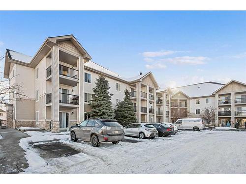 1350-2395 Eversyde Avenue Sw, Calgary, AB - Outdoor With Balcony With Facade