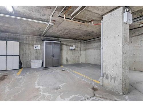 1350-2395 Eversyde Avenue Sw, Calgary, AB - Indoor Photo Showing Garage