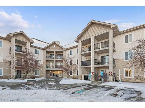 1350-2395 Eversyde Avenue Sw, Calgary, AB - Outdoor With Balcony With Facade