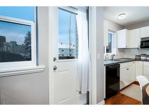 27 Mcdougall Court Ne, Calgary, AB - Indoor Photo Showing Kitchen With Double Sink