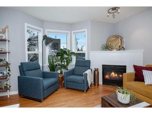 27 Mcdougall Court Ne, Calgary, AB - Indoor Photo Showing Living Room With Fireplace