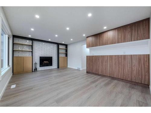 287 Hawkwood Drive Nw, Calgary, AB - Indoor With Fireplace