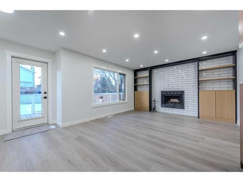 287 Hawkwood Drive Nw, Calgary, AB - Indoor With Fireplace