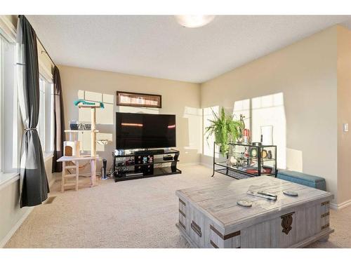 332 Auburn Bay Blvd Se, Calgary, AB - Indoor Photo Showing Living Room