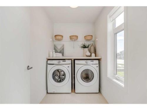 #319-857 Belmont Drive Sw, Calgary, AB - Indoor Photo Showing Laundry Room