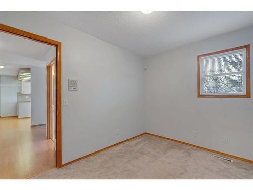 27-26 Quigley Drive, Cochrane, AB - Indoor Photo Showing Other Room