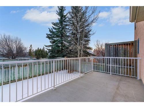 27-26 Quigley Drive, Cochrane, AB - Outdoor With Exterior