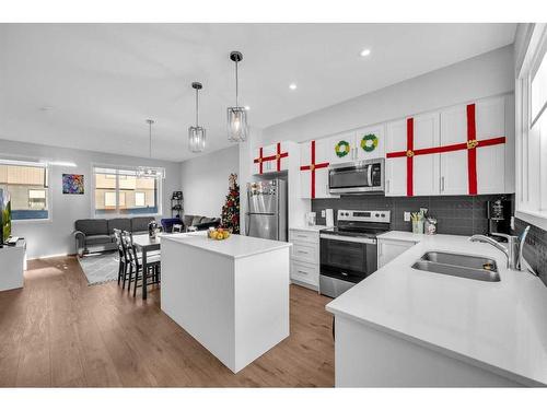 114 Corner Glen Circle Ne, Calgary, AB - Indoor Photo Showing Kitchen With Double Sink