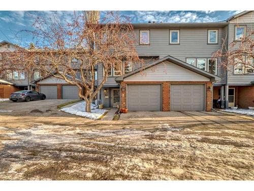 15-64 Woodacres Crescent Sw, Calgary, AB - Outdoor With Facade