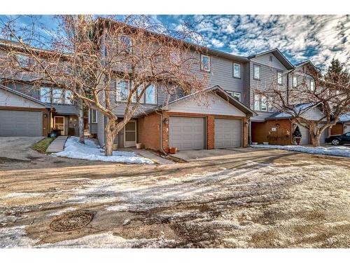 15-64 Woodacres Crescent Sw, Calgary, AB - Outdoor With Facade