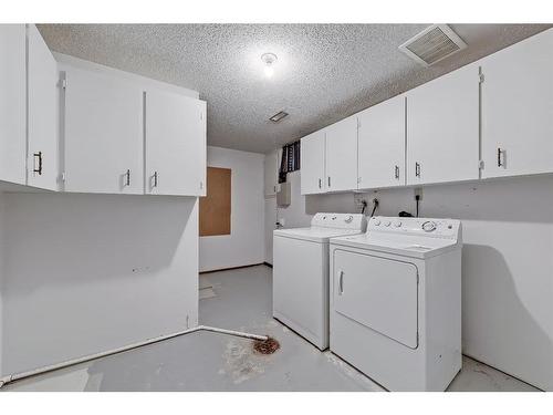 703 Ranchview Circle Nw, Calgary, AB - Indoor Photo Showing Laundry Room