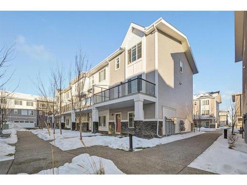 209-669 Savanna Blvd, Calgary, AB - Outdoor With Facade