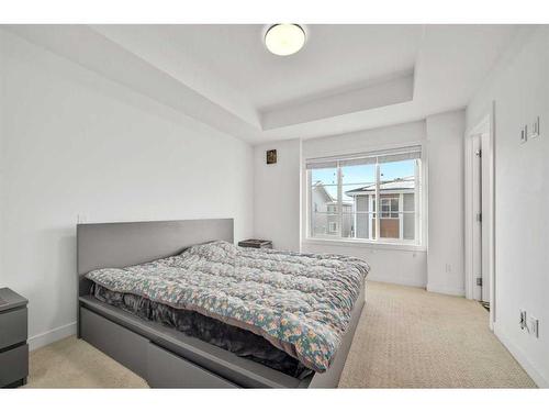 209-669 Savanna Blvd, Calgary, AB - Indoor Photo Showing Bedroom