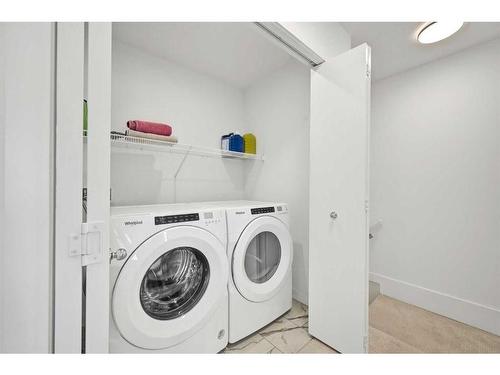 209-669 Savanna Blvd, Calgary, AB - Indoor Photo Showing Laundry Room