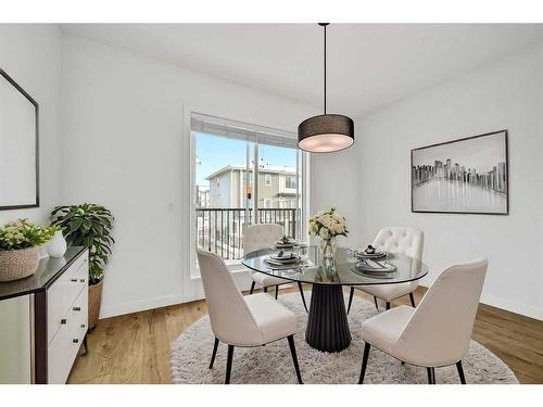 209-669 Savanna Blvd, Calgary, AB - Indoor Photo Showing Dining Room