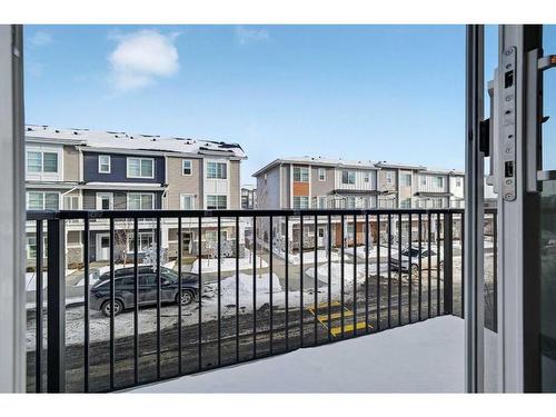 209-669 Savanna Blvd, Calgary, AB - Outdoor