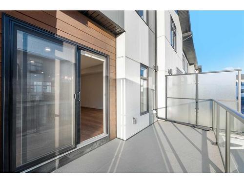 206-8235 8 Avenue Sw, Calgary, AB - Outdoor With Balcony With Exterior