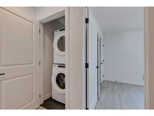 206-8235 8 Avenue Sw, Calgary, AB - Indoor Photo Showing Laundry Room