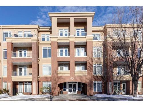 403-4 Hemlock Crescent Sw, Calgary, AB - Outdoor With Balcony With Facade