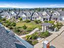 50 Drake Landing Square, Okotoks, AB  - Outdoor With Facade 