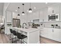 50 Drake Landing Square, Okotoks, AB  - Indoor Photo Showing Kitchen With Double Sink With Upgraded Kitchen 