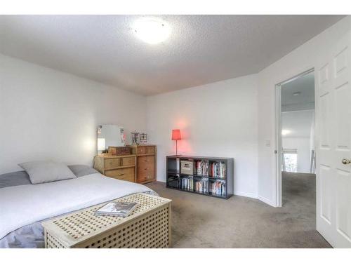 9-5790 Patina Drive Sw, Calgary, AB - Indoor Photo Showing Bedroom