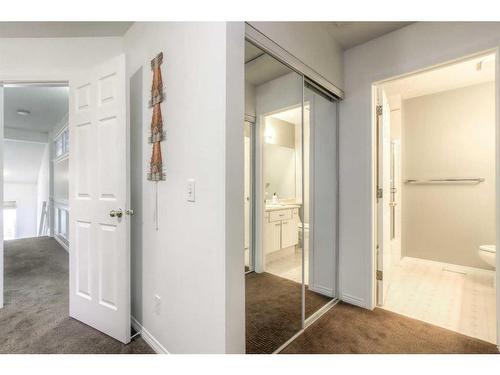 9-5790 Patina Drive Sw, Calgary, AB - Indoor Photo Showing Other Room