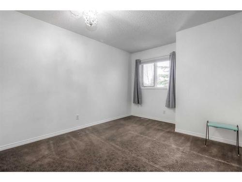 9-5790 Patina Drive Sw, Calgary, AB - Indoor Photo Showing Other Room