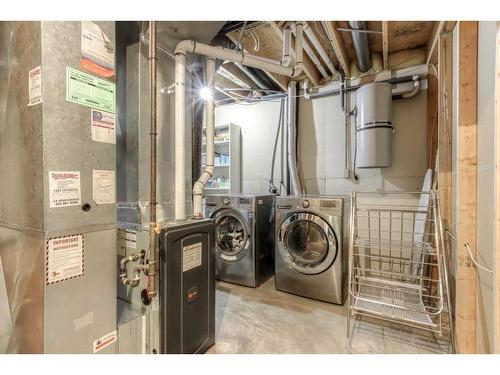 9-5790 Patina Drive Sw, Calgary, AB - Indoor Photo Showing Laundry Room