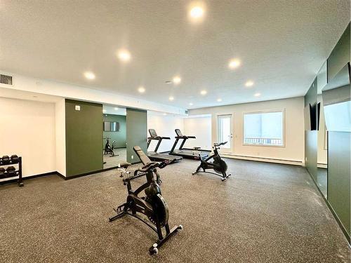 2101-111 Wolf Creek Drive Se, Calgary, AB - Indoor Photo Showing Gym Room