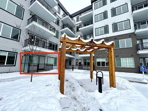 2101-111 Wolf Creek Drive Se, Calgary, AB - Outdoor With Balcony With Facade