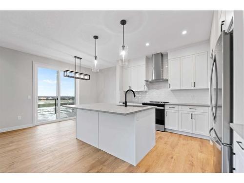 3042 Key Drive, Airdrie, AB - Indoor Photo Showing Kitchen With Upgraded Kitchen