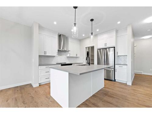 3042 Key Drive, Airdrie, AB - Indoor Photo Showing Kitchen With Upgraded Kitchen