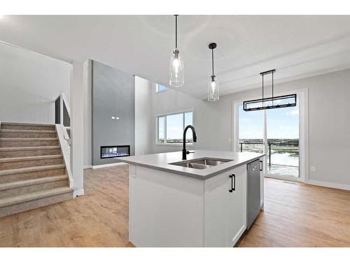 3042 Key Drive, Airdrie, AB - Indoor Photo Showing Kitchen With Double Sink With Upgraded Kitchen