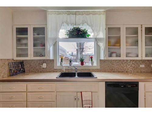 45 Elma Street West, Okotoks, AB - Indoor Photo Showing Kitchen With Double Sink