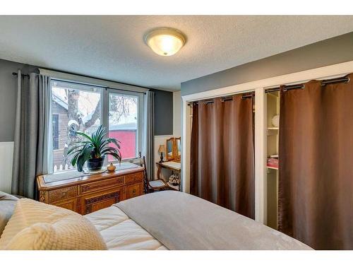 45 Elma Street West, Okotoks, AB - Indoor Photo Showing Bedroom