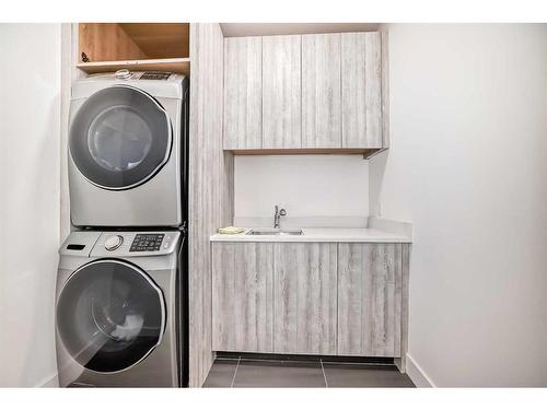 923 36A Street Nw, Calgary, AB - Indoor Photo Showing Laundry Room