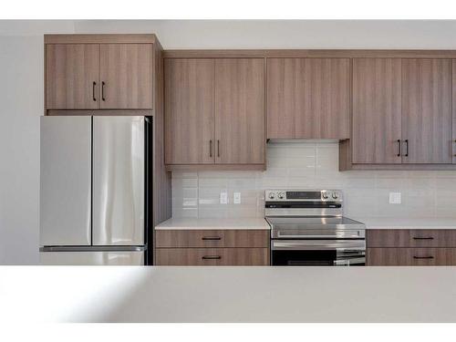 309-85 Sage Hill Heights, Calgary, AB - Indoor Photo Showing Kitchen With Stainless Steel Kitchen