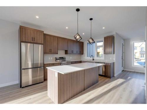 309-85 Sage Hill Heights, Calgary, AB - Indoor Photo Showing Kitchen With Stainless Steel Kitchen With Upgraded Kitchen