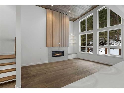 251A Three Sisters Drive, Canmore, AB - Indoor With Fireplace