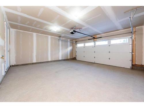 305-280 Chelsea Road, Chestermere, AB - Indoor Photo Showing Garage