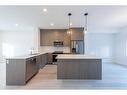 305-280 Chelsea Road, Chestermere, AB  - Indoor Photo Showing Kitchen With Stainless Steel Kitchen With Upgraded Kitchen 