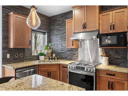 37 Wentworth Way Sw, Calgary, AB - Indoor Photo Showing Kitchen With Double Sink With Upgraded Kitchen