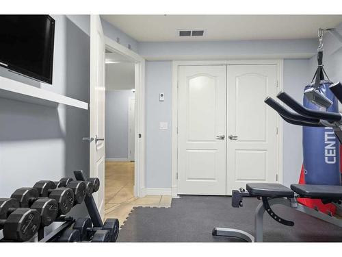 37 Wentworth Way Sw, Calgary, AB - Indoor Photo Showing Gym Room