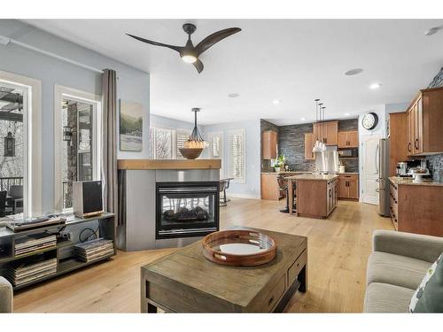 37 Wentworth Way Sw, Calgary, AB - Indoor Photo Showing Living Room With Fireplace