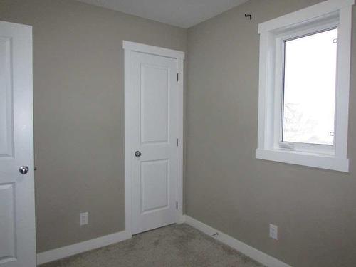 135 4 Avenue Se, High River, AB - Indoor Photo Showing Other Room